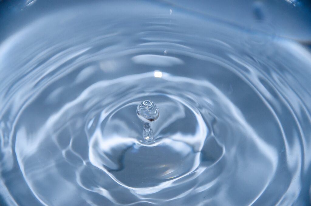 Why is water both polar and nonpolar?