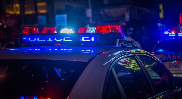 Why do cops touch the tail lights?