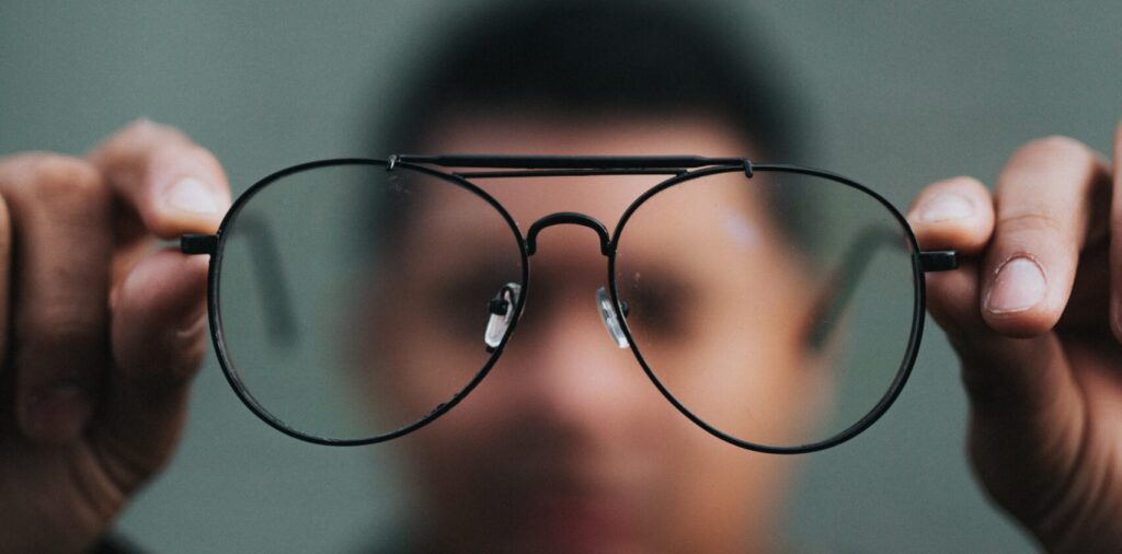 Does 20/25 vision require glasses?