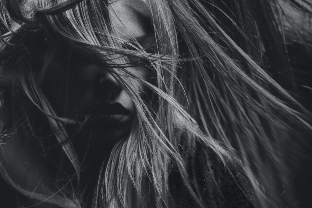 Why is pubic hair curly and coarse ?