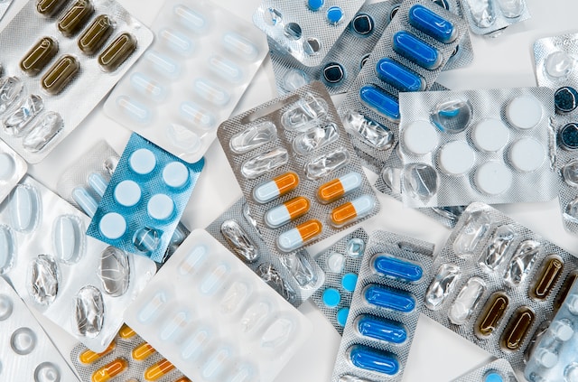 What pain reliever can I take with antibiotics?