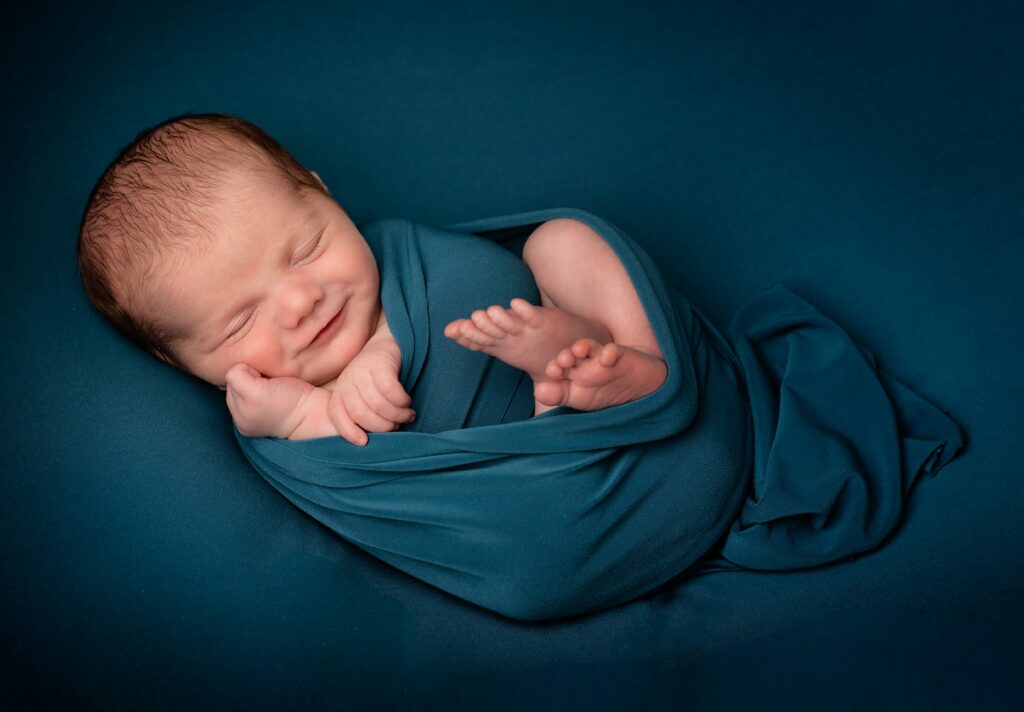 Why do babies lift legs up in the air while sleeping?