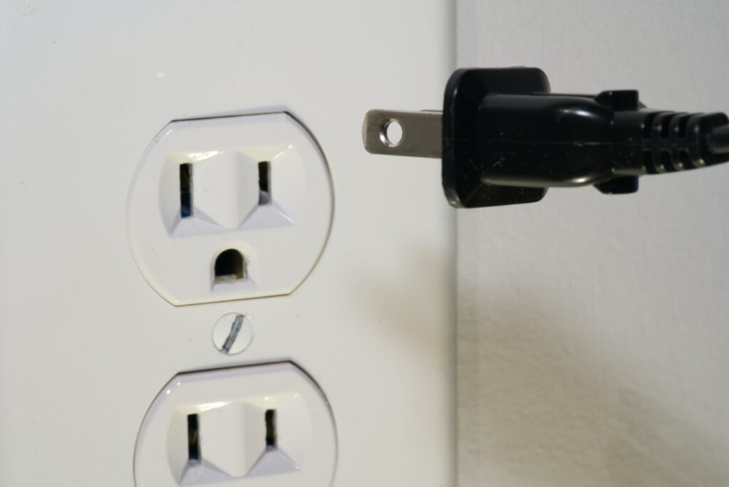 How many volts are in a wall outlet?