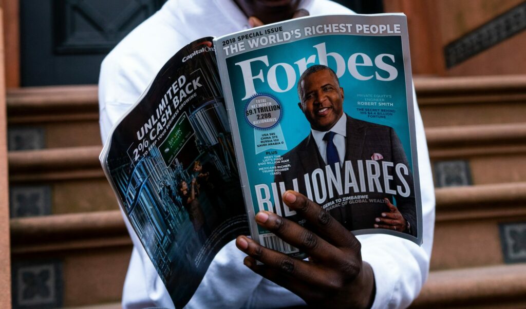 At what age did oprah winfrey became a billionaire?