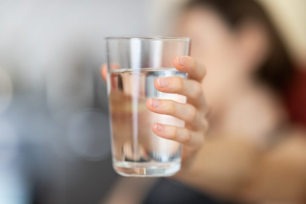 Does drinking water help your period end faster?