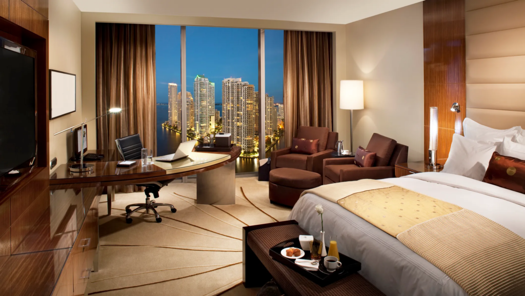 Can someone over 21 check me into a hotel?