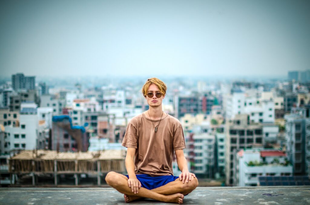What does it mean when a guy sits cross legged?
