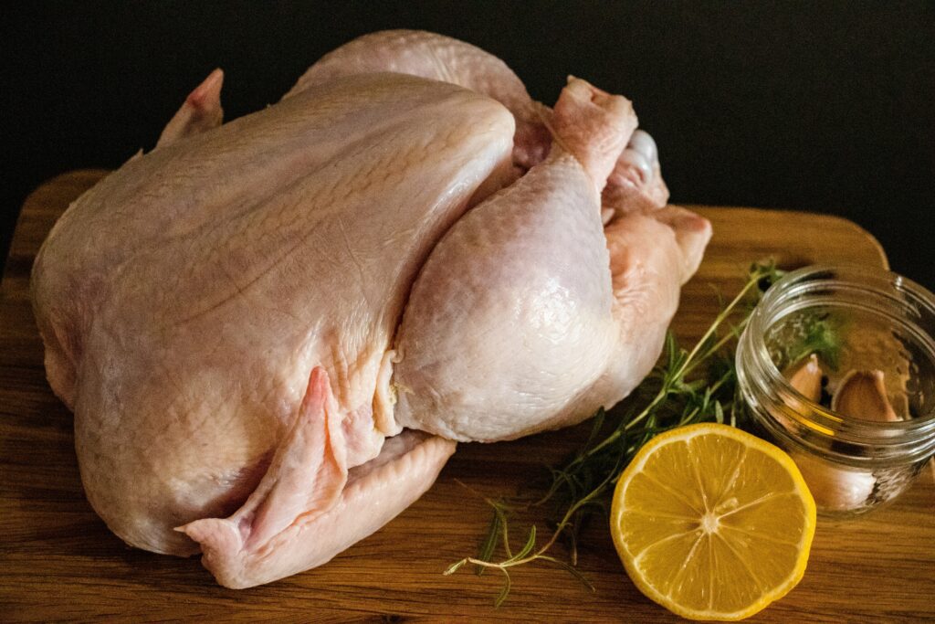 Can you defrost chicken in hot water without a bag