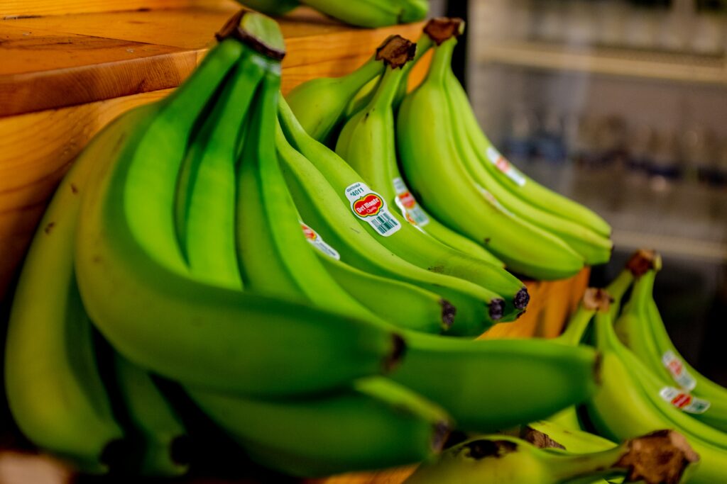 Why are my green bananas not turning yellow?