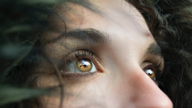 Why do redheads have green eyes