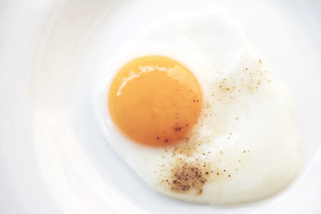 Why is my hard-boiled egg yolk black?