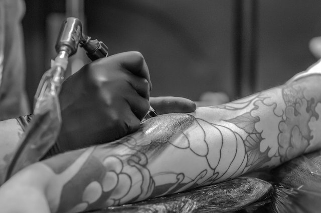 What happens if you touch up a tattoo too soon?