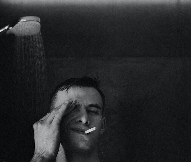 Does smoking in shower get rid of smell?