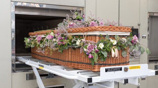 Why do they break a stick at a royal funeral